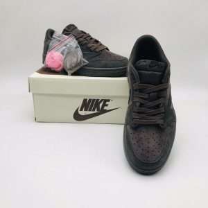 The Nike Air Jordan 1 x Travis Scott “Velvet Brown” brings a fresh, luxurious twist to one of sneaker culture’s most iconic silhouettes. This collaboration between Jordan Brand and the Houston-born rapper Travis Scott fuses classic design with his distinct streetwear flair. The sneaker stands out with a premium velvet and nubuck upper, dressed in rich shades of chocolate brown, soft beige, and deep cream, giving it a sophisticated yet rugged aesthetic.