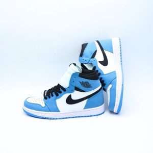 The Air Jordan 1 Retro High OG University Blue is a modern classic that pays homage to the heritage of the Jordan brand while embracing a fresh, collegiate-inspired aesthetic. Dressed in a striking blend of white, black, and the iconic University Blue, this pair delivers a clean look that stands out both on the court and in everyday style. The smooth and premium leather construction offers durability and long-lasting comfort, while the suede overlays add a touch of luxury and texture to the design. The high-top silhouette provides essential ankle support, echoing the original basketball purpose of the Air Jordan 1.