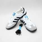 The Adidas Samba stands as one of the most legendary and timeless sneakers ever created, combining vintage charm with modern lifestyle appeal. Originally designed as an indoor soccer shoe, the Samba has evolved far beyond the sports world and become an essential style icon across generations. Its signature low-top silhouette, clean lines, and minimalistic design create a refined look that pairs effortlessly with any outfit—whether you prefer casual streetwear, athletic fits, or even something slightly more polished. The smooth leather upper and suede toe cap not only enhance durability but also add a textured contrast that elevates its visual appeal.