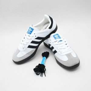 The Adidas Samba stands as one of the most legendary and timeless sneakers ever created, combining vintage charm with modern lifestyle appeal. Originally designed as an indoor soccer shoe, the Samba has evolved far beyond the sports world and become an essential style icon across generations. Its signature low-top silhouette, clean lines, and minimalistic design create a refined look that pairs effortlessly with any outfit—whether you prefer casual streetwear, athletic fits, or even something slightly more polished. The smooth leather upper and suede toe cap not only enhance durability but also add a textured contrast that elevates its visual appeal.